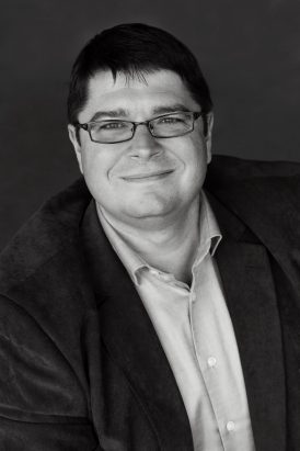 Headshot of Jason Owen‑Smith