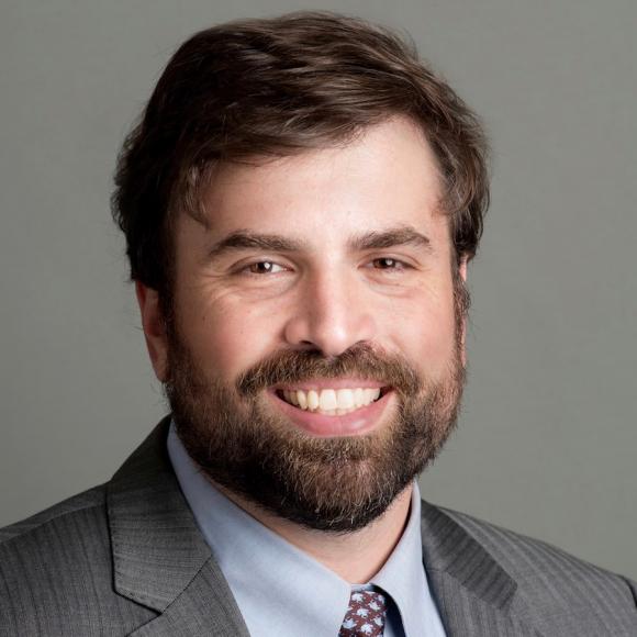Headshot of Adam Zelizer
